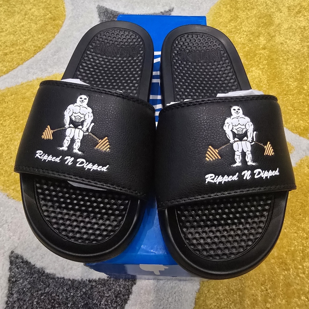 RipNDip Kids black slides with white accents
